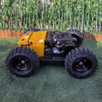 Yellow remote wheeled mower (VTW550-90) with brakes and vacuum tyres - Image 3