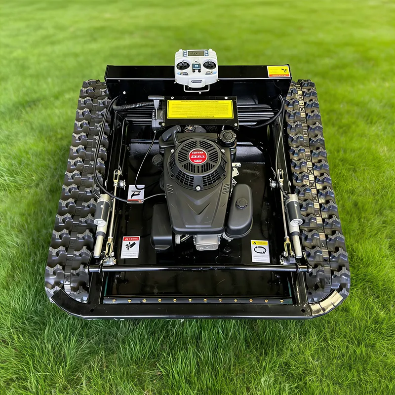black-tracked-lawn-mower-top-view-grass-field-control-panel SN-600DL Long Track Remote Control Lawn Mower with Engine Options